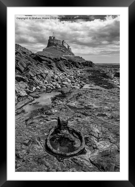 mooring ring at lindisfarne castle monochrome Framed Mounted Print by Graham Moore