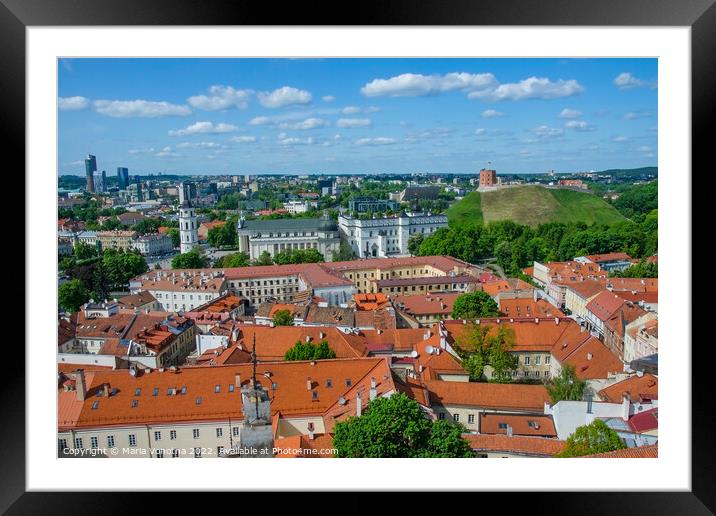 Vilnius city center in Lithuania Framed Mounted Print by Maria Vonotna