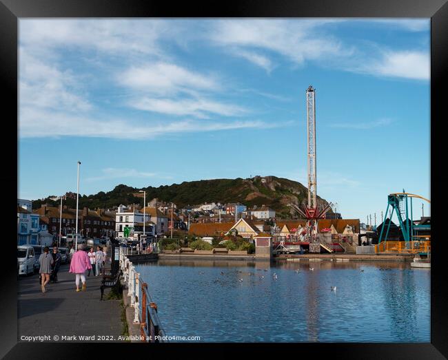 Seaside Attractions in Hastings. Framed Print by Mark Ward