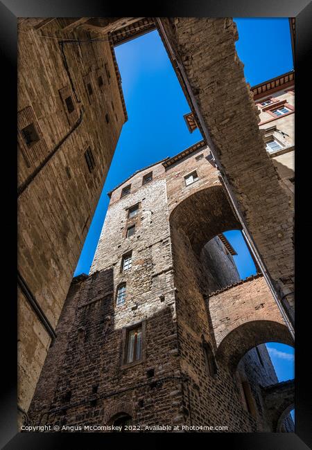 Stone vaulting and arches in Perugia, Umbria Framed Print by Angus McComiskey