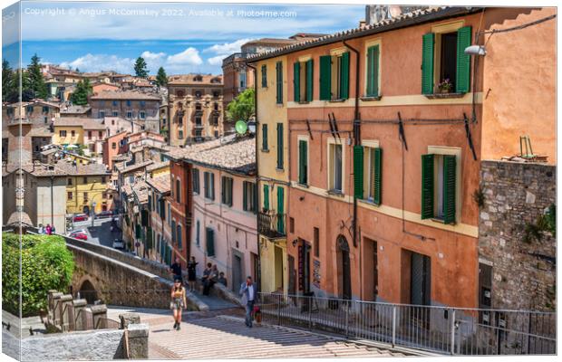 Colourful buildings beside the aqueduct in Perugia Canvas Print by Angus McComiskey