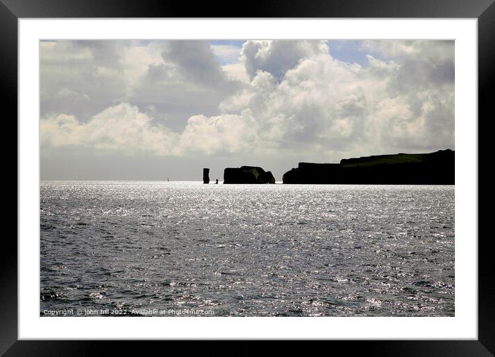 Old Harry rock in Silhouette. Framed Mounted Print by john hill