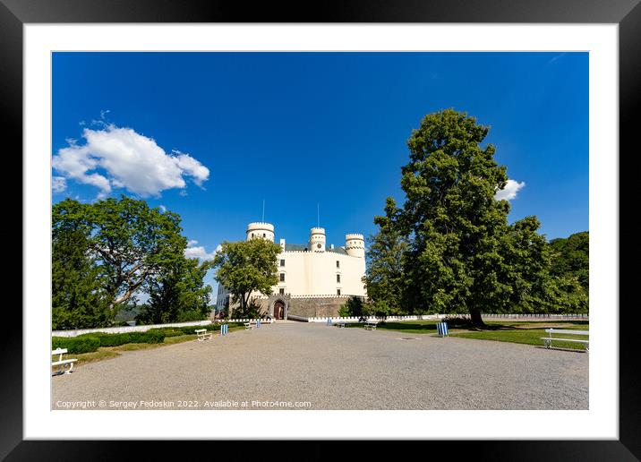 Orlik castle with blue sky and trees. Orlik nad Vltavou, Czechia Framed Mounted Print by Sergey Fedoskin
