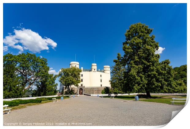 Orlik castle with blue sky and trees. Orlik nad Vltavou, Czechia Print by Sergey Fedoskin