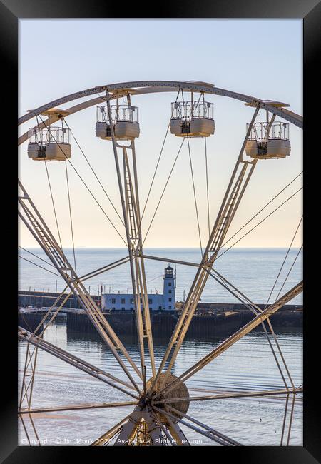 Wheel and Lighthouse, Scarborough Framed Print by Jim Monk