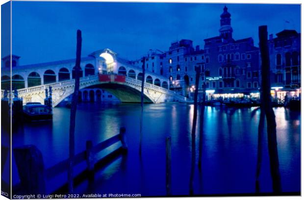 Rialto Bridge under the moon light, Venice, Italy. Canvas Print by Luigi Petro