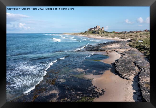 Bamburgh Castle from the north elevated Framed Print by Graham Moore