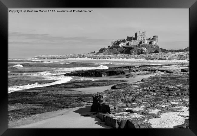 Bamburgh Castle from the north monochrome Framed Print by Graham Moore