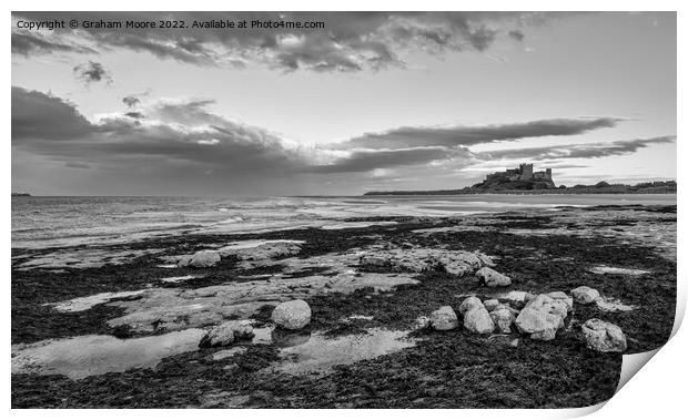 Bamburgh Castle from Harkness Rocks dusk monochrome Print by Graham Moore