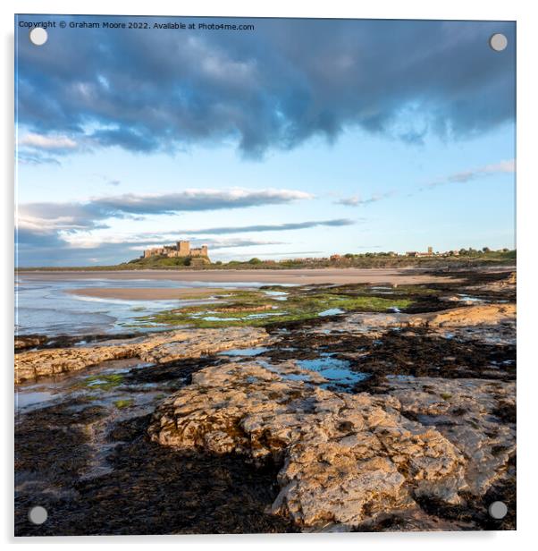 Bamburgh Castle from Harkness Rocks sunset elevated Acrylic by Graham Moore