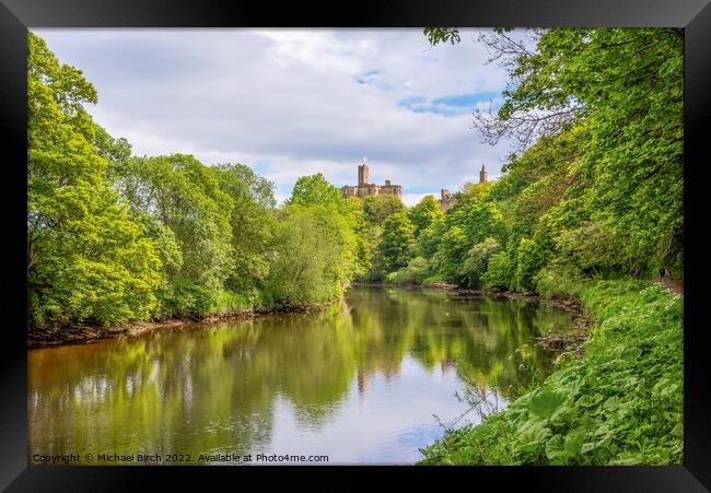 Serene Reflections of Warkworth Castle Framed Print by Michael Birch