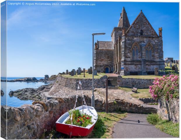 St Monans Parish Church and floral boat Canvas Print by Angus McComiskey