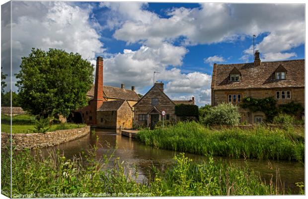 View of Watermill Lower Slaughter Cotswolds Canvas Print by Jenny Hibbert