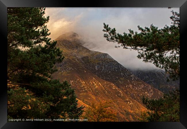 Ben Nevis peaking through the clouds Scotland Framed Print by Jenny Hibbert