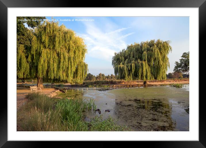 The pond is drying up Framed Mounted Print by Kevin White