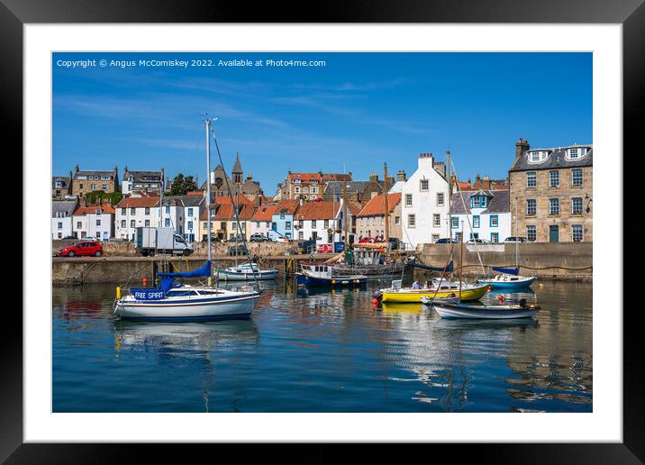 Boats moored in St Monans harbour Framed Mounted Print by Angus McComiskey
