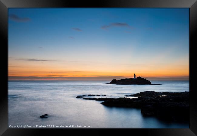 Godrevy Lighthouse at dusk Framed Print by Justin Foulkes