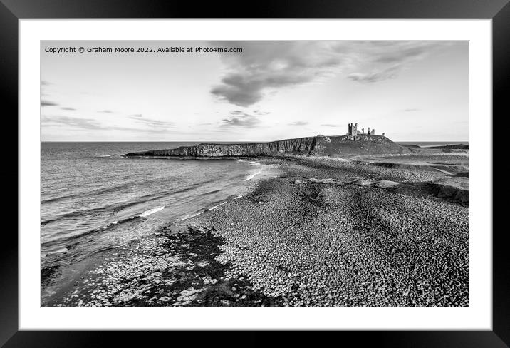 Dunstanburgh Castle from the north elevated monochrome Framed Mounted Print by Graham Moore