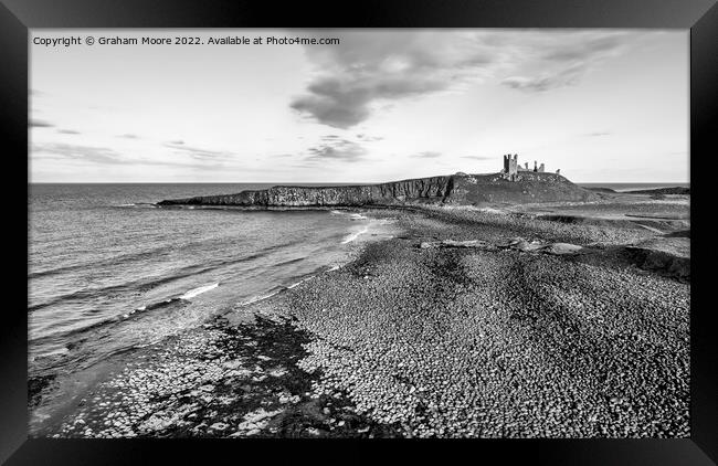 Dunstanburgh Castle from the north elevated monochrome Framed Print by Graham Moore