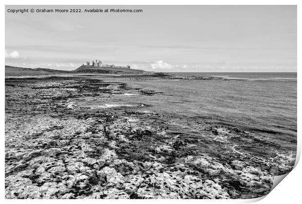 Dunstanburgh Castle from the south elevated monochrome Print by Graham Moore