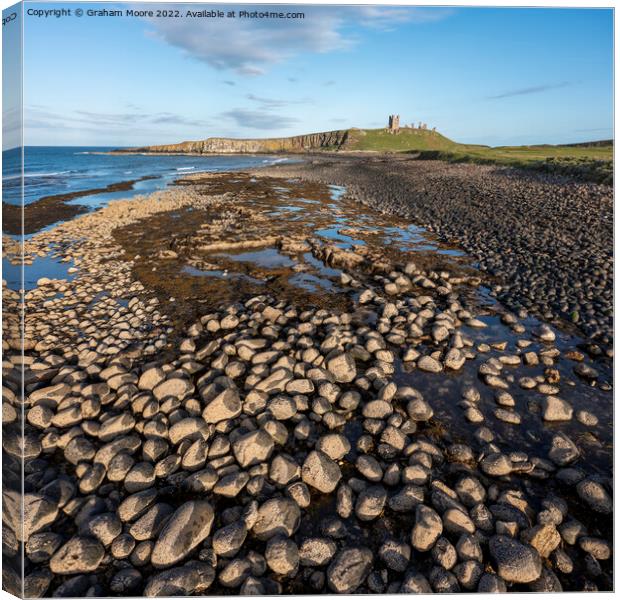 Dunstanburgh Castle from the north elevated evening Canvas Print by Graham Moore