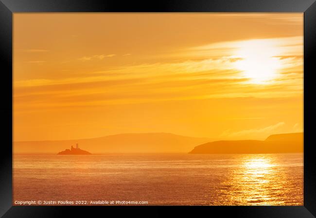 Sunrise over Godrevy Lighthouse, West Cornwall Framed Print by Justin Foulkes