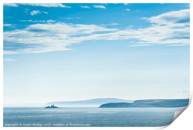 Blue skies over Godrevy Lighthouse, Cornwall Print by Justin Foulkes