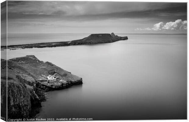 Worm's head, Rhossili Bay, Wales, in black and white Canvas Print by Justin Foulkes