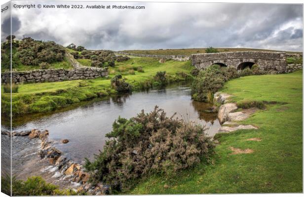 Water flowing under Cherry Brook Bridge Canvas Print by Kevin White