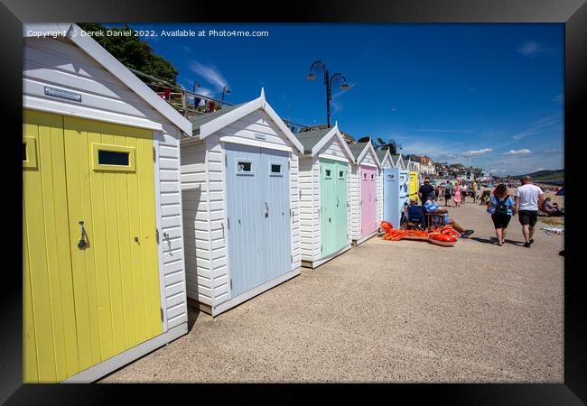 Colourful Beach Huts at Lyme Regis Framed Print by Derek Daniel