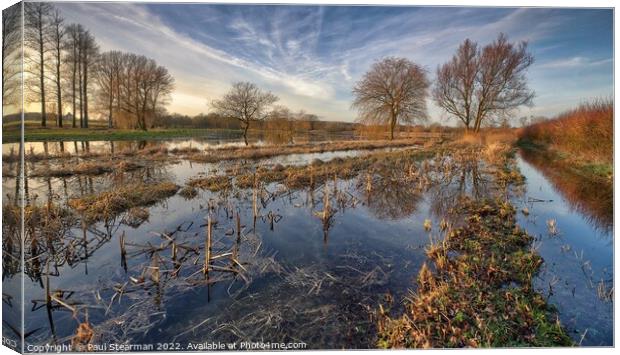 Flooded fields at Bintree Norfolk UK Canvas Print by Paul Stearman