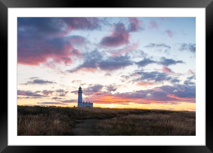 Flamborough sunset Framed Mounted Print by Kevin Winter