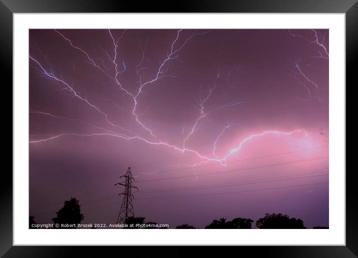 Lightning in the sky at night Framed Mounted Print by Robert Brozek
