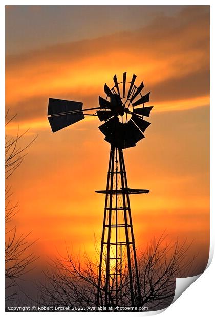 Kansas Golden Sunset with a windmill silhouette Print by Robert Brozek