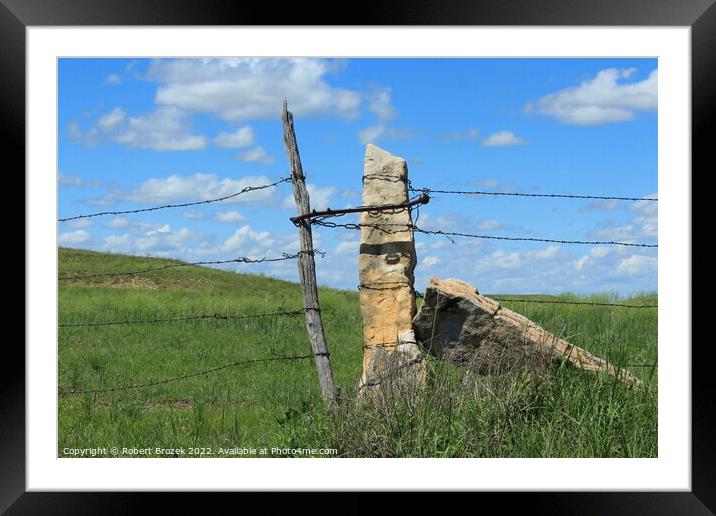 Outdoor stone post fence with grass Framed Mounted Print by Robert Brozek