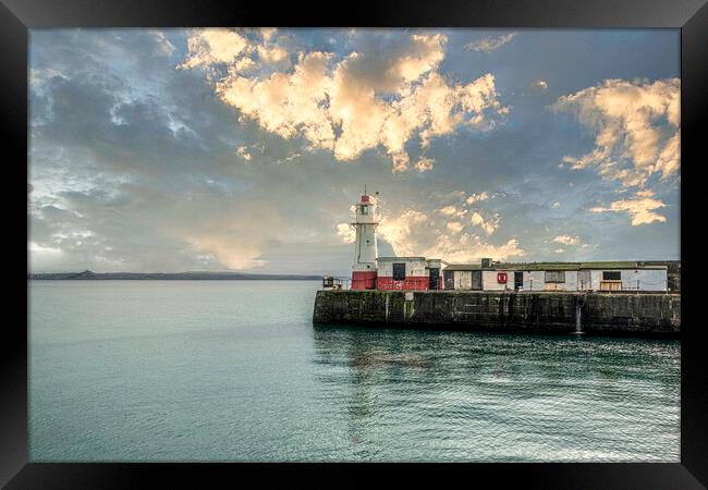 Newlyn harbour lighthouse Framed Print by kathy white