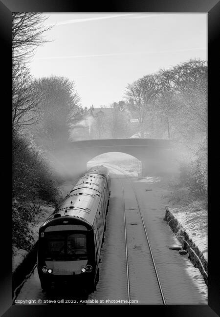 Diesel Train Leaving Harrogate on a Misty Winter Morning. Framed Print by Steve Gill