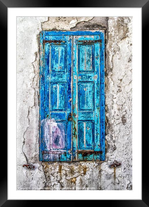 Old blue shutters against a faded plaster wall Framed Mounted Print by Kevin Hellon