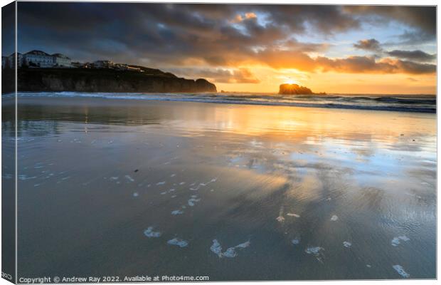 Setting sun behind Chapel Rock (Perranporth)  Canvas Print by Andrew Ray