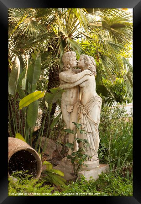 Statue of Lovers Kissing in Garden Framed Print by Christine Kerioak