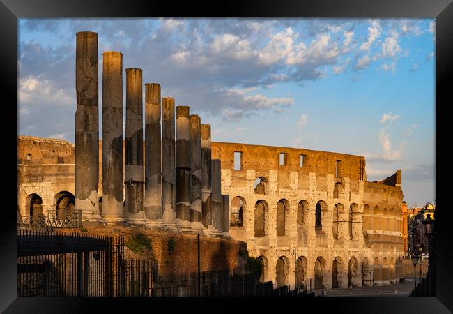 Colosseum and Via Sacra Columns at Sunset Framed Print by Artur Bogacki