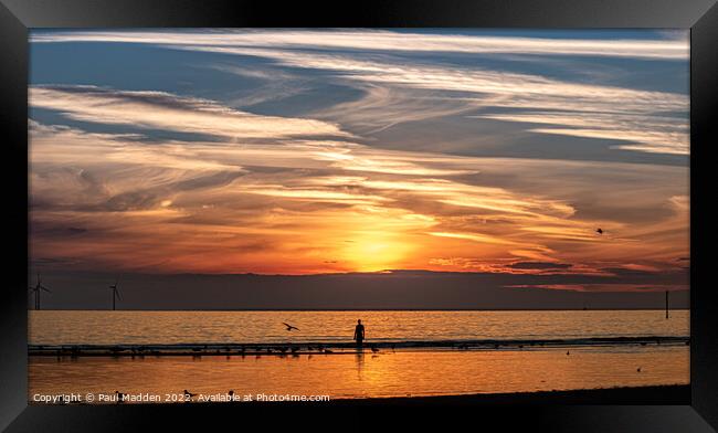 Crosby Beach as the sun sets Framed Print by Paul Madden