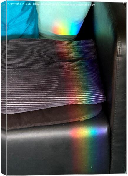 Prisms of rainbow colours over chair & cushion Canvas Print by DEE- Diana Cosford