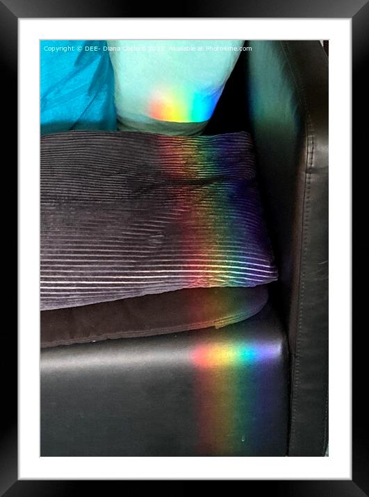 Prisms of rainbow colours over chair & cushion Framed Mounted Print by DEE- Diana Cosford