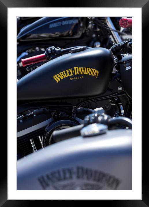 Abstract detail of a row of parked Harley davidson bikes Framed Mounted Print by Phil Crean