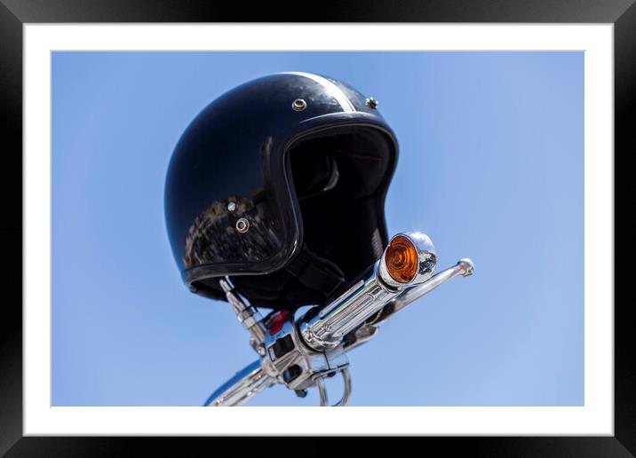 Crash helmet on handlebars Framed Mounted Print by Phil Crean