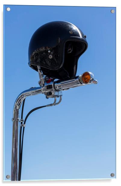 Open face crash helmet on handlebars of a motorcycle against a blue sky Acrylic by Phil Crean