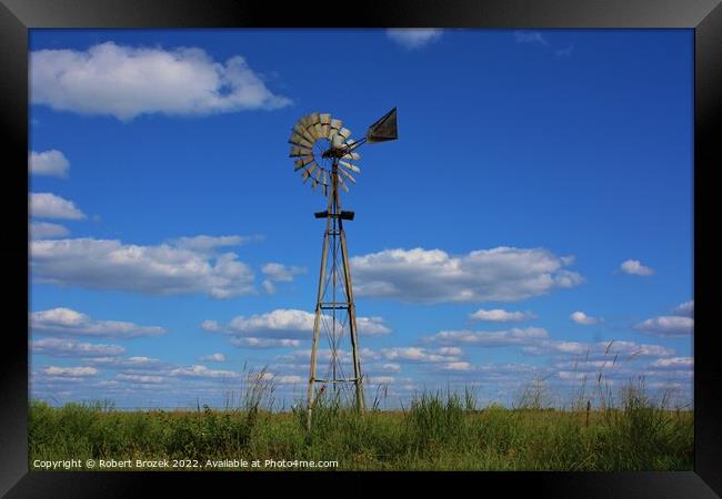 sky with windmill and clouds Framed Print by Robert Brozek