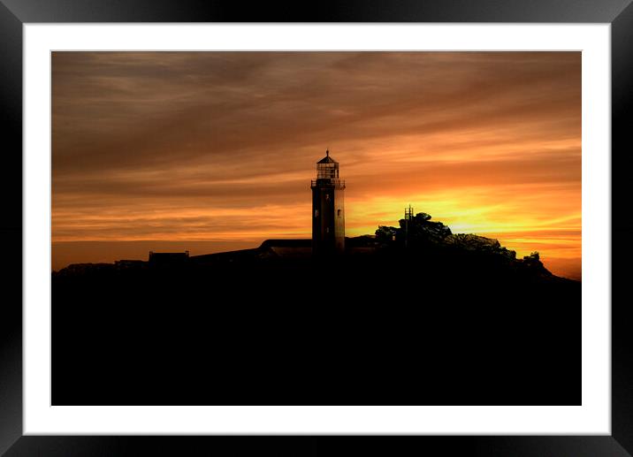 silhouette at sunset with orange sky Framed Mounted Print by kathy white