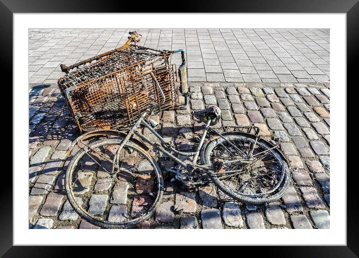 Rusty bicycle got out water from cleaning the port of Kiel in Ge Framed Mounted Print by Michael Piepgras